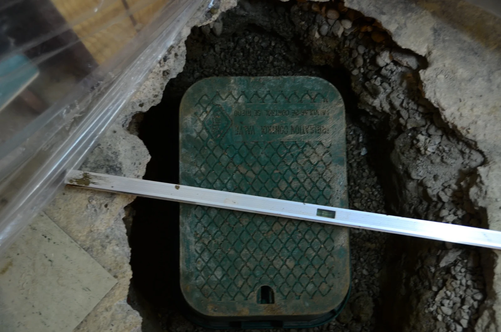 Basement floor opened for a backwater valve installation